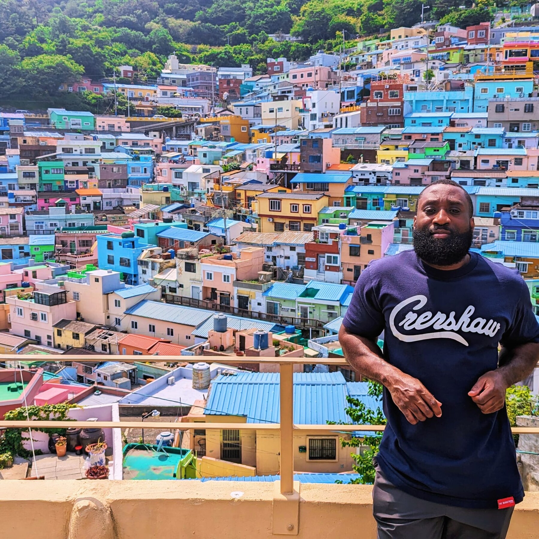 Lee Sam overlooking the colourful hillside houses in Busan