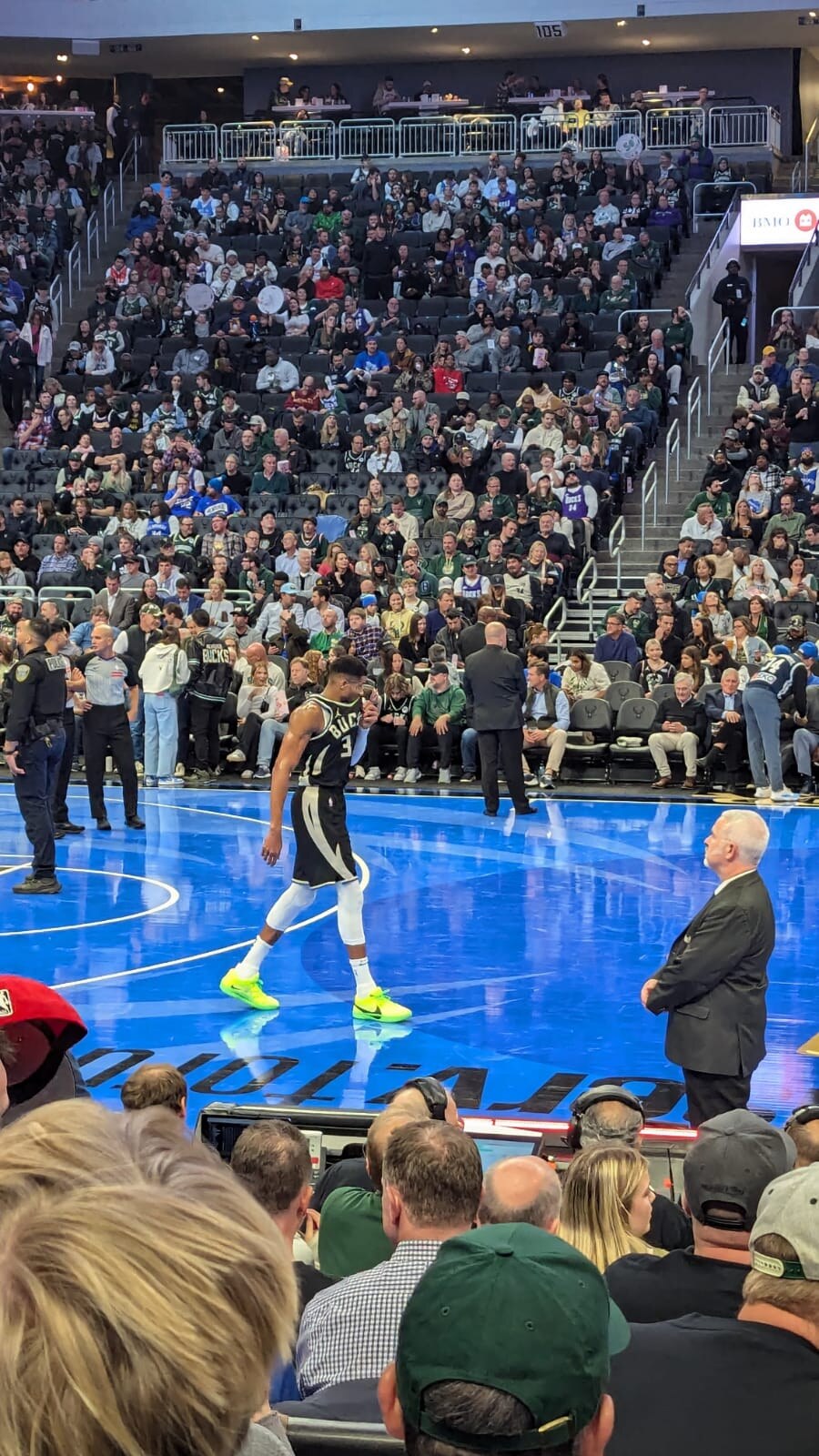 Giannis Antetokounmpo courtside during a Milwaukee Bucks game