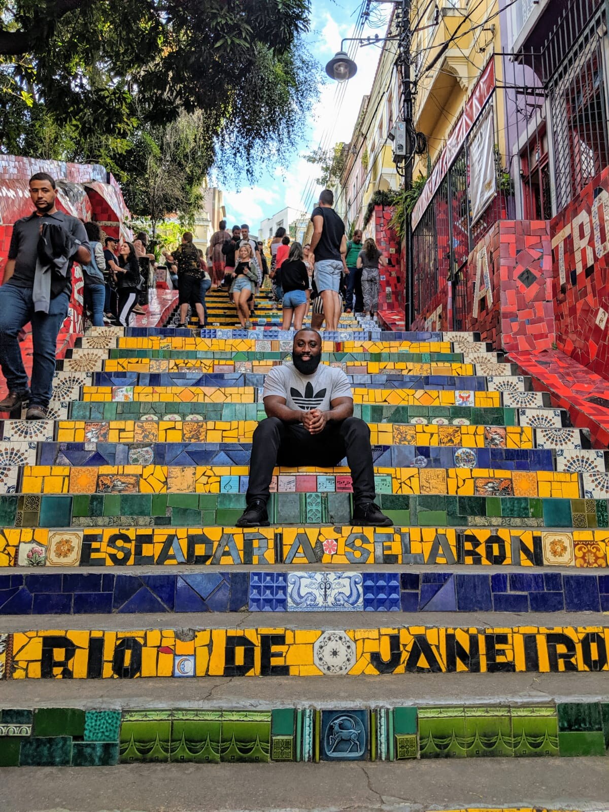 Lee Sam sitting on the Escadaria Selaron steps in Rio